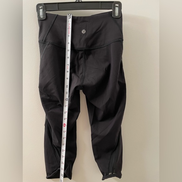 Lululemon 25 inch black leggings with sheer striped sides - Picture 8 of 9